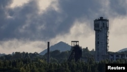 Smoke rises after shelling during Ukraine-Russia conflict in Donetsk, Ukraine, July 6, 2022. 