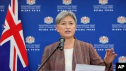 Australian Foreign Minister Penny Wong speaks during a press conference after meeting with Malaysian Foreign Minister Saifuddin Abdullah during visit to Foreign Ministry in Putrajaya, Malaysia, June 28, 2022.
