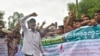 Rohingya refugees participate in a "Let's go home" rally demanding repatriation at the Kutupalong Rohingya camp in Cox's Bazar, Bangladesh, June 19, 2022.