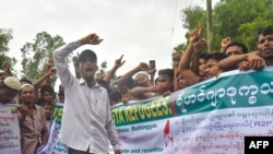 Rohingya refugees participate in a "Let's go home" rally demanding repatriation at the Kutupalong Rohingya camp in Cox's Bazar, Bangladesh, June 19, 2022.