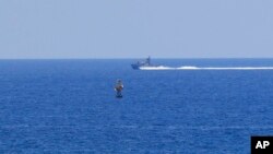 FILE - An Israeli Navy vessel patrols in the Mediterranean Sea, while Lebanon and Israel are being called to resume indirect talks over their disputed maritime border with US mediation, off the southern town of Naqoura, June 6, 2022.