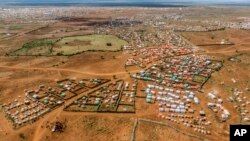 The Kaam Jiroon camp for the internally-displaced is seen from the air in Baidoa, Somalia, June 15, 2022.