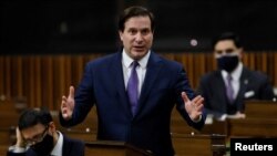 Canada's Minister of Public Safety Marco Mendicino speaks about the trucker protest during an emergency debate in the House of Commons on Parliament Hill in Ottawa, Ontario, Canada Feb. 7, 2022. 