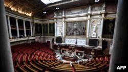 FILE - A photograph taken on May 17, 2022 shows a general view of the hemicycle of the French National Assembly in Paris. 