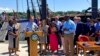 Emkhosini owenzelwe phambi komkhumbi onjengaleyo eyasetshenziswa ukuthwala abensundu besenziwa izigqili. usiblaukhulu we Connecticut uMnu.. Ned Lamont, ekhuluma engakasayini umthetho owenza ilanga lika mhlaka 19 Nhlangulaukuba likhefu.