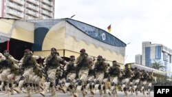 FILE - Cameronian troops march during a parade in Yaounde on May 20, 2022.