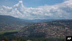 FILE - The Rwandan capital of Kigali is seen from one of the overlooking hills on April 6, 2014. Expectations are high in Rwanda as the East African nation prepares to host the Commonwealth Heads of Government Summit in June 2022.