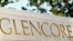 FILE - The logo of commodities trader Glencore is pictured in front of the company's headquarters in Baar, Switzerland, July 18, 2017. 