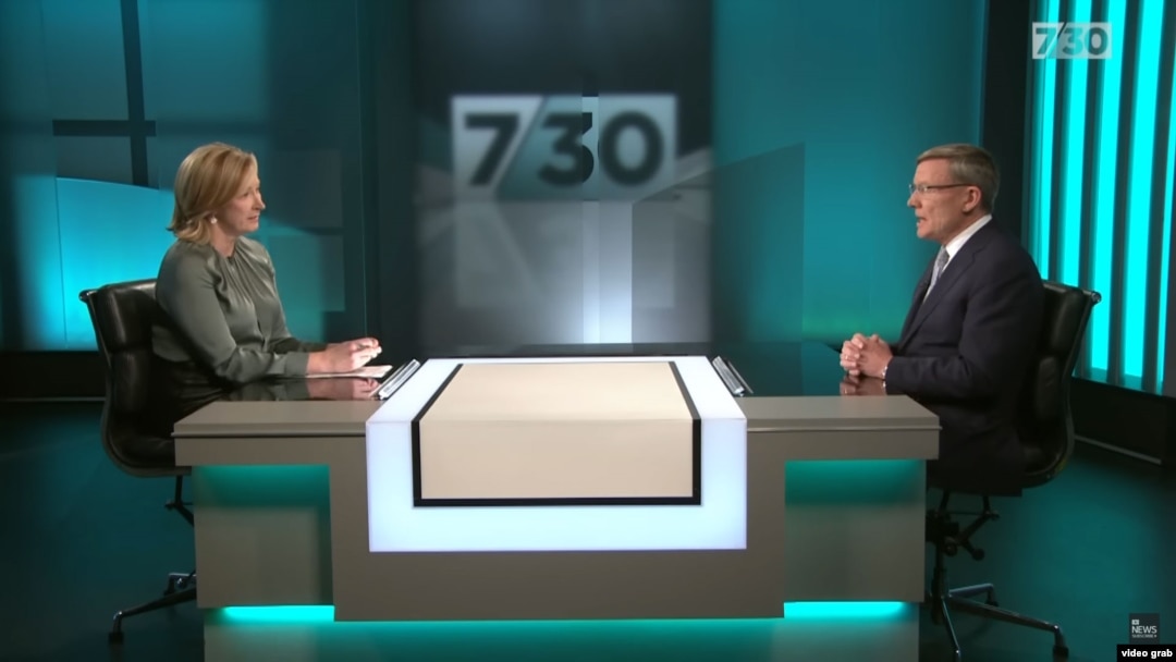 Australian Secret Intelligence Service director-general Paul Symon speaks to Australian Broadcasting Corporation host Leigh Sales during a televised interview.