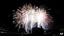 Fireworks to mark the Fourth of July holiday explode over Coors Field after a baseball game between the Arizona Diamondbacks and the Colorado Rockies on July 1, 2022, in Denver.