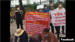 Người dân biểu tình ngày 8/6/2022 trước văn phòng Thủ tướng Chính phủ tại Hà Nội. Photo Chụp từ video Facebook Hương Đỗ.