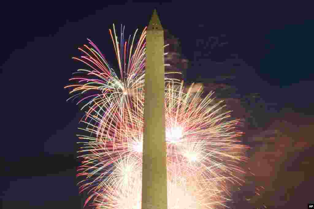 Fireworks explode over the Washington Monument at the National Mall during the Independence Day celebrations in Washington, July 4, 2022
