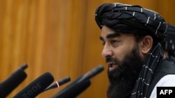 Taliban spokesman Zabihullah Mujahid speaks during a press conference in Kabul on June 30, 2022.
