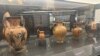 Various amphoras from VI century BC are displayed at the Rescued Art Museum in Rome. (Sabina Castelfranco/VOA)
