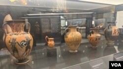 Various amphoras from VI century BC are displayed at the Rescued Art Museum in Rome. (Sabina Castelfranco/VOA)
