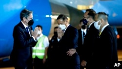 US Secretary of State Antony Blinken is greeted by Michael Health of the US Mission in Thailand, and Chettaphan Maksamphan, MFA DG American and South Pacific Affairs, upon his arrival at Bangkok Don Mueang International Airport in Thailand, July 9, 2022.