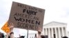 People protest following the Supreme Court's decision to overturn Roe v. Wade in Washington, June 24, 2022. 