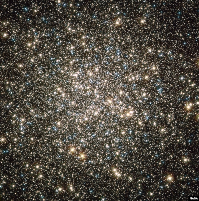 This image, captured by NASA's Hubble Space Telescope, shows the M13, or Hercules constellation, located 25,000 light-years from Earth. Image Credits: NASA, ESA, and the Hubble Heritage Team)