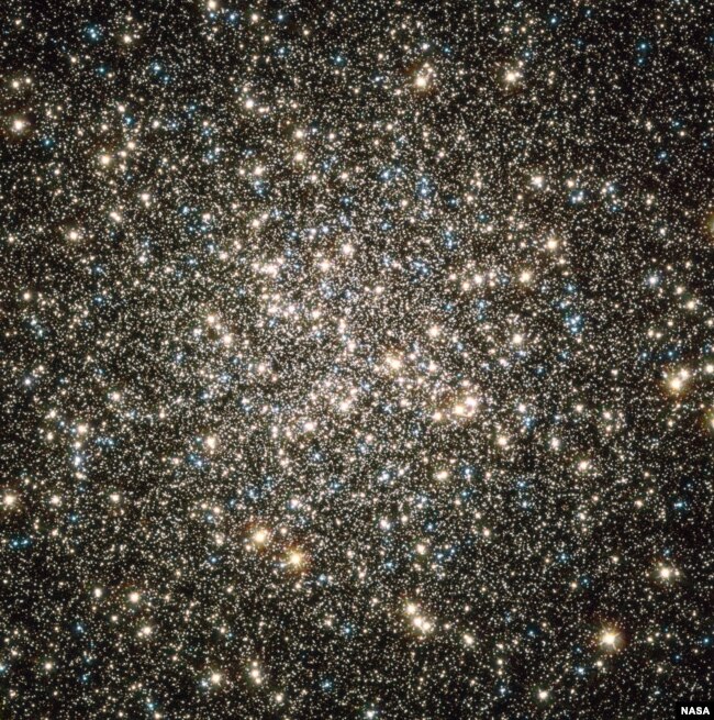 This image, captured by NASA's Hubble Space Telescope, shows the M13, or Hercules constellation, located 25,000 light-years from Earth. Image Credits: NASA, ESA, and the Hubble Heritage Team)