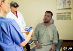 Mixed Reality memungkinkan akses jarak jauh ke pasien secara langsung, dengan menggunakan HoloLens dan piranti lunak atau ponsel pintar (Foto: Business Wire)