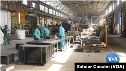 Workers at recycling plant, South Africa