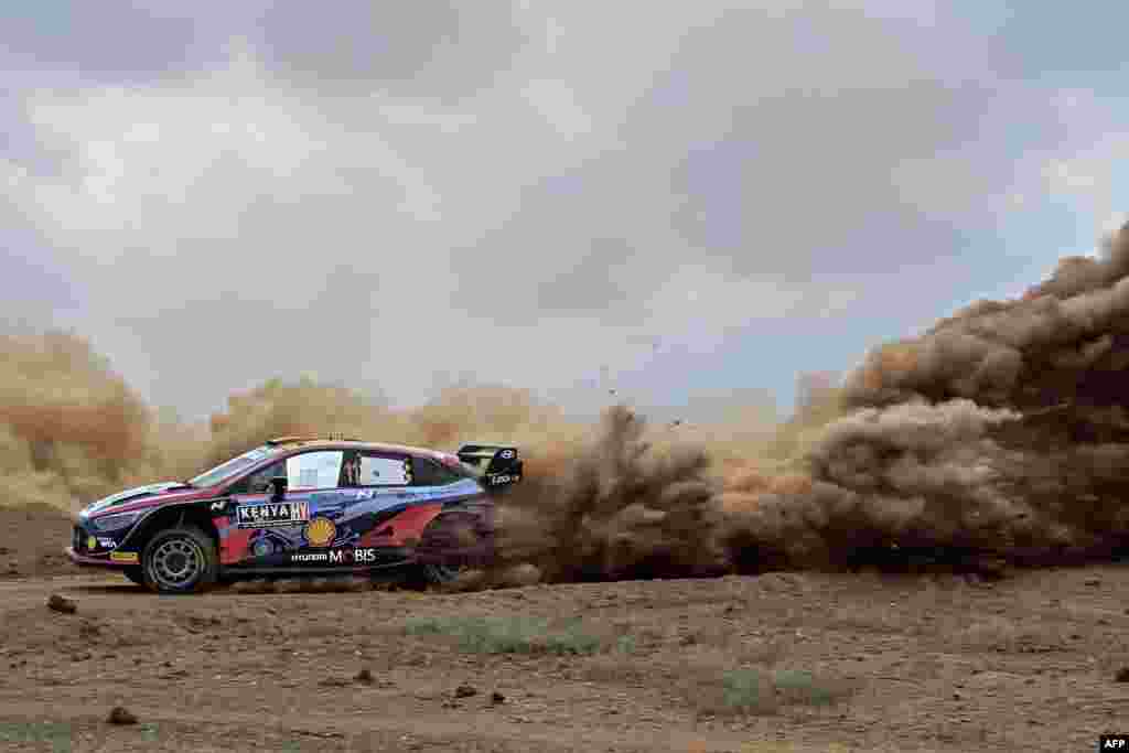 Belgian driver Thierry Neuville steers his Hyundai i20 N with Belgian co-driver Martijn Wydaeghe during the Super Special Stage of Safari Rally Kenya 2022, the 6th round of the FIA World Rally Championship, in Nairobi.