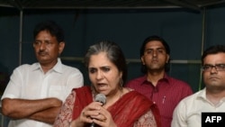 FILE - Indian civil rights activist Teesta Setalvad (C), secretary for the Citizens for Justice and Peace (CJP), is celebrated at an event in a Muslim-dominated area of Ahmedabad on June 2, 2016.