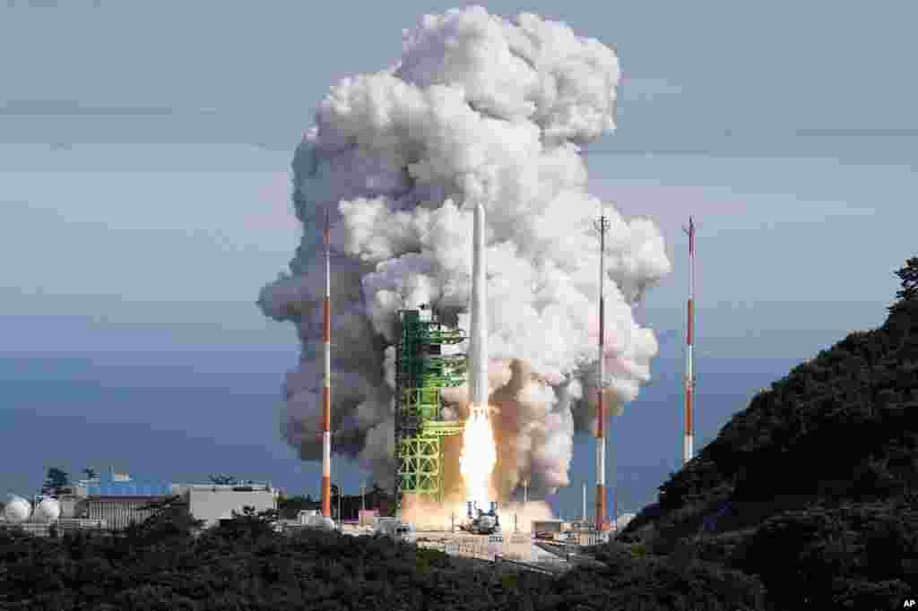 In this photo provided by Korea Aerospace Research Institute, the Nuri rocket, the first domestically produced space rocket, lifts off from a launch pad at the Naro Space Center in Goheung, South Korea.