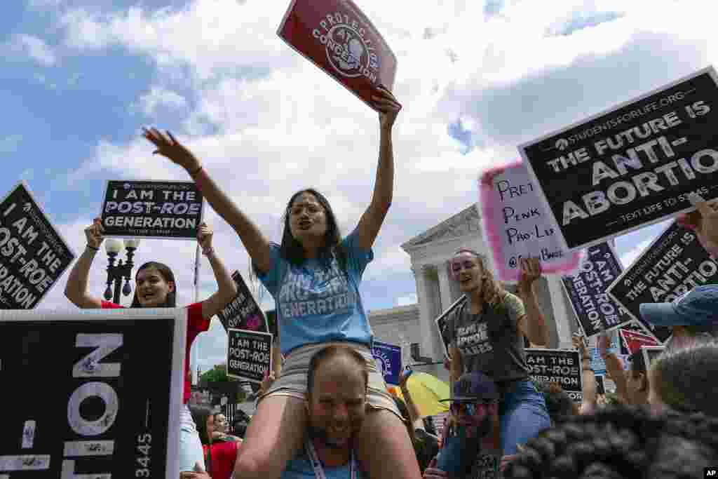 Anti-abortion protesters celebrate outside the Supreme Court in Washington.