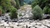 Sungai Sangone, cabang dari sungai Po, di Beinasco, Turino, Italia mengalami kekeringan terburuk dalam 70 tahun (foto: dok). 