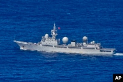 在澳大利亚国防部提供的这张图片中，2022 年 5 月 11 日星期三，中国人民解放军-海军 (PLA-N) 情报收集船“海王星”号在澳大利亚西北大陆架外作业。澳大利亚国防部长彼得·达顿2022 年 5 月 13 日星期五说，具有间谍能力的中国军舰一直紧挨西部海岸线，这相当于一种“侵略行为”。 （澳大利亚国防部，美联社）