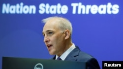 FILE - Matthew Olsen, U.S. assistant attorney general for national security, speaks during a National Security Institute event at George Mason University in Arlington, Virginia, Feb. 23, 2022.