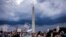 FILE: Abortion rights activists march past the Washington Monument as they protest in Washington, DC, on June 26, 2022, two days after the US Supreme Court scrapped half-century constitutional protections for the procedure.