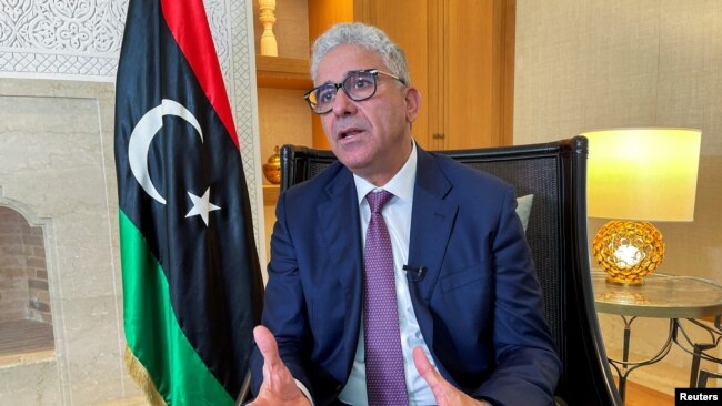 FILE - Libya's Fathi Bashagha, who was appointed prime minister by the eastern-based parliament this month, speaks during an interview with Reuters in Tunis, Tunisia, March 30, 2022.