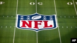 FILE - A close up view of the National Football League logo painted on the field prior to the NFL Super Bowl 56 football game, Sunday, Feb. 13, 2022, Inglewood, California.