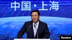 FILE - Shanghai Party Secretary Li Qiang speaks at the opening ceremony of the World Artificial Intelligence Conference (WAIC) in Shanghai, China July 9, 2020.