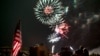 FILE - Spectators watch as fireworks explode overhead during the Fourth of July celebration in Prescott, Ariz. The skies over a scattering of Western cities will stay dark for the third consecutive Fourth of July in 2022 as some big fireworks displays are