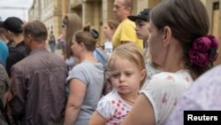 People board a train to Dnipro and Lviv during an evacuation of civilians from war-affected areas of eastern Ukraine, amid Russia's invasion of the country, in Pokrovsk, Donetsk region, Ukraine, June 25, 2022.