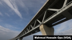 The Padma Bridge near Dhaka, Bangladesh, took eight years to build and was plagued by delays, political conflict, high costs and graft allegations. (Mahmud Hossain Opu/VOA)