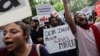 Members and supporters of All India Students' Association (AISA) shout slogans during a protest against what they say are attacks on Muslims, in New Delhi, India, June 13, 2022. 