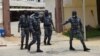 ARCHIVES - Des policiers à Cotonou, au Bénin, le 12 avril 2021.