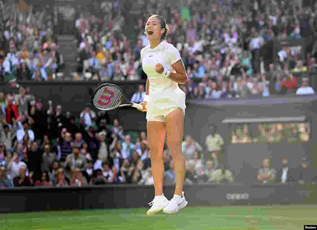 Britain&#39;s Emma Raducanu celebrates winning her first-round match against Belgium&#39;s Alison Van Uytvanck during the Wimbledon Tennis Championships at The All England Tennis Club in Wimbledon, England, June 27, 2022.