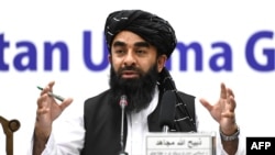 FILE - Taliban spokesman Zabihullah Mujahid speaks during a press conference in Kabul on June 30, 2022. Mujahid on Aug. 17 condemned the bombing of Kabul's Siddiquiya Mosque and said the attackers would soon be brought to justice.