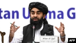 FILE - Taliban spokesman Zabihullah Mujahid speaks during a press conference in Kabul on June 30, 2022. Taliban security forces killed two key Islamic State commanders in a raid Feb. 26, 2023, in Kabul, Mujahid said Feb. 27, 2023.