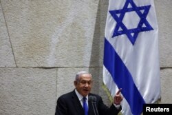 Former Israeli Prime Minister Benjamin Netanyahu speaks at the plenum at the Knesset, Israel's parliament, in Jerusalem, June 30, 2022.