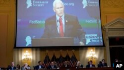 A video is shown of former Vice President Mike Pence speaking before The Federalist Society as the House select committee investigating the January 6, 2021, attack on the Capitol holds a hearing at the Capitol in Washington, June 16, 2022. 