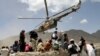 Helikopter Taliban lepas landas setelah membawa bantuan ke lokasi gempa di Gayan, Afghanistan, 23 Juni 2022. (REUTERS/Ali Khara)