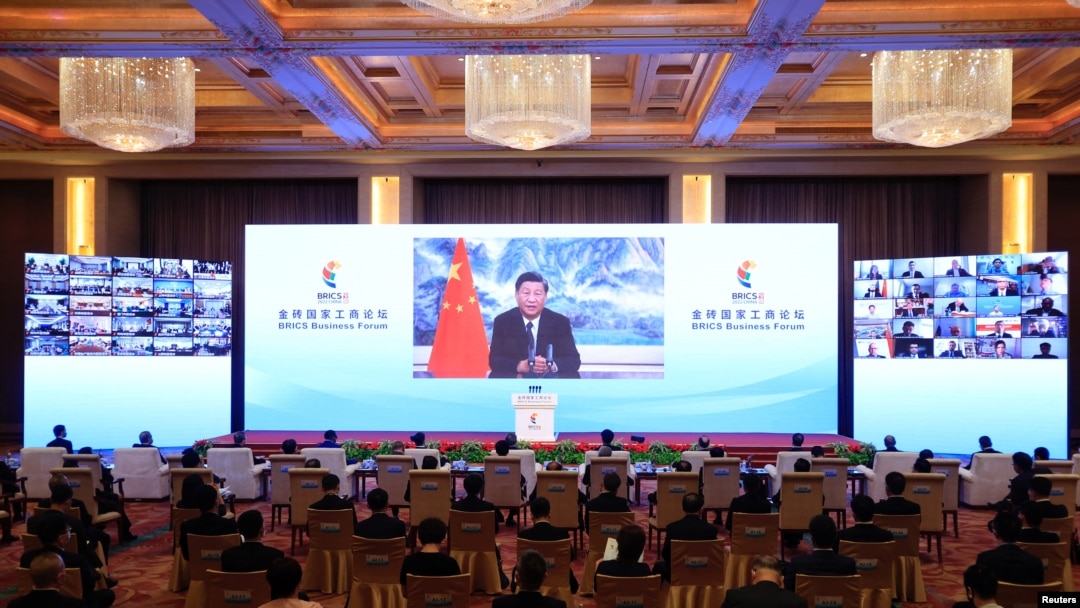 FILE - Chinese President Xi Jinping delivers a speech via video at the opening ceremony of the BRICS Business Forum, in Beijing, June 22, 2022.