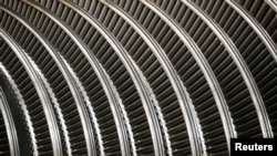 FILE - Part of a turbine is seen at a Siemens plant in Goerlitz, Germany, July 15, 2019. 