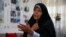 FILE - Faezeh Hashemi, the activist daughter of Iran's late President Akbar Hashemi Rafsanjani, speaks during an interview in Tehran, Iran, Sept. 6, 2018.